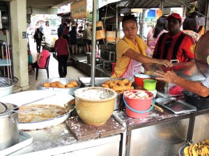Making banana fritters