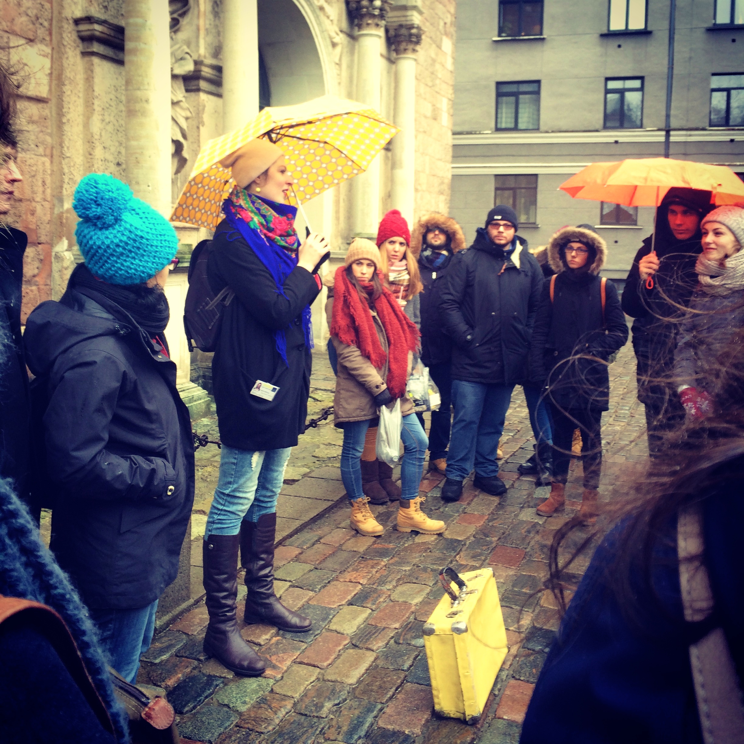 Riga Free Tour; yellow suitcase