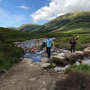 Rock jumping the Fairy Pools, Isle of Skye